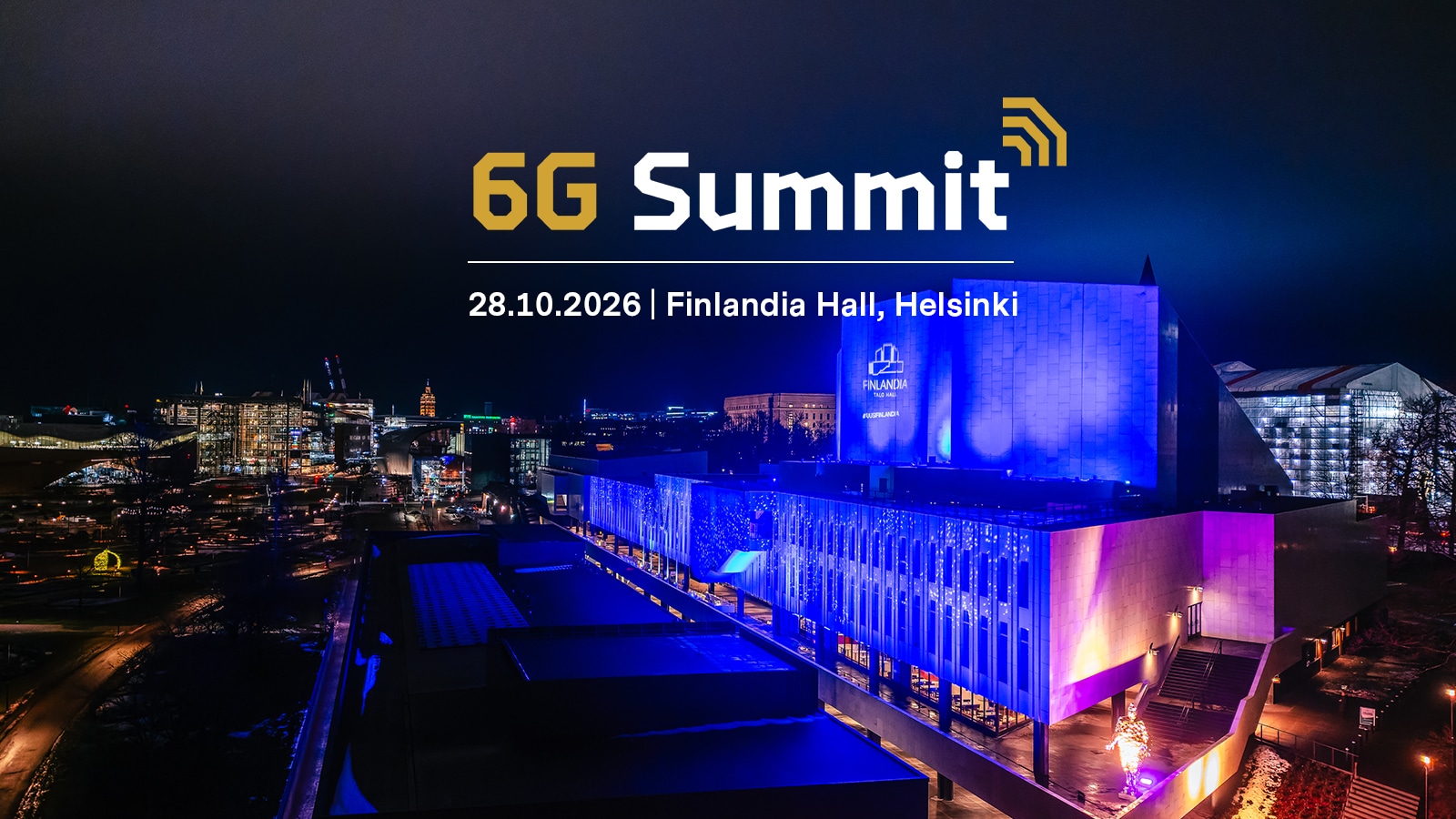 6G Summit logo over a night time view of the Finlandia Hall and the Töölö bay area in Helsinki, Finland.