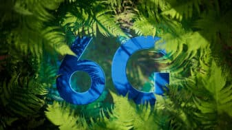 Blue 6G text surrounded by green ferns symbolising eco-friendly technology