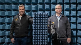 Dean Jukka Riekki and Research Director Hannu Nikurautio at the University of Oulu's anechoic chamber.