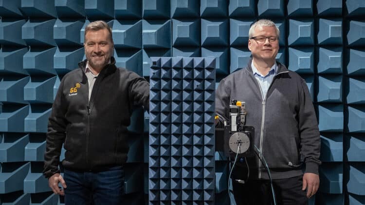 Dean Jukka Riekki and Research Director Hannu Nikurautio at the University of Oulu's anechoic chamber.